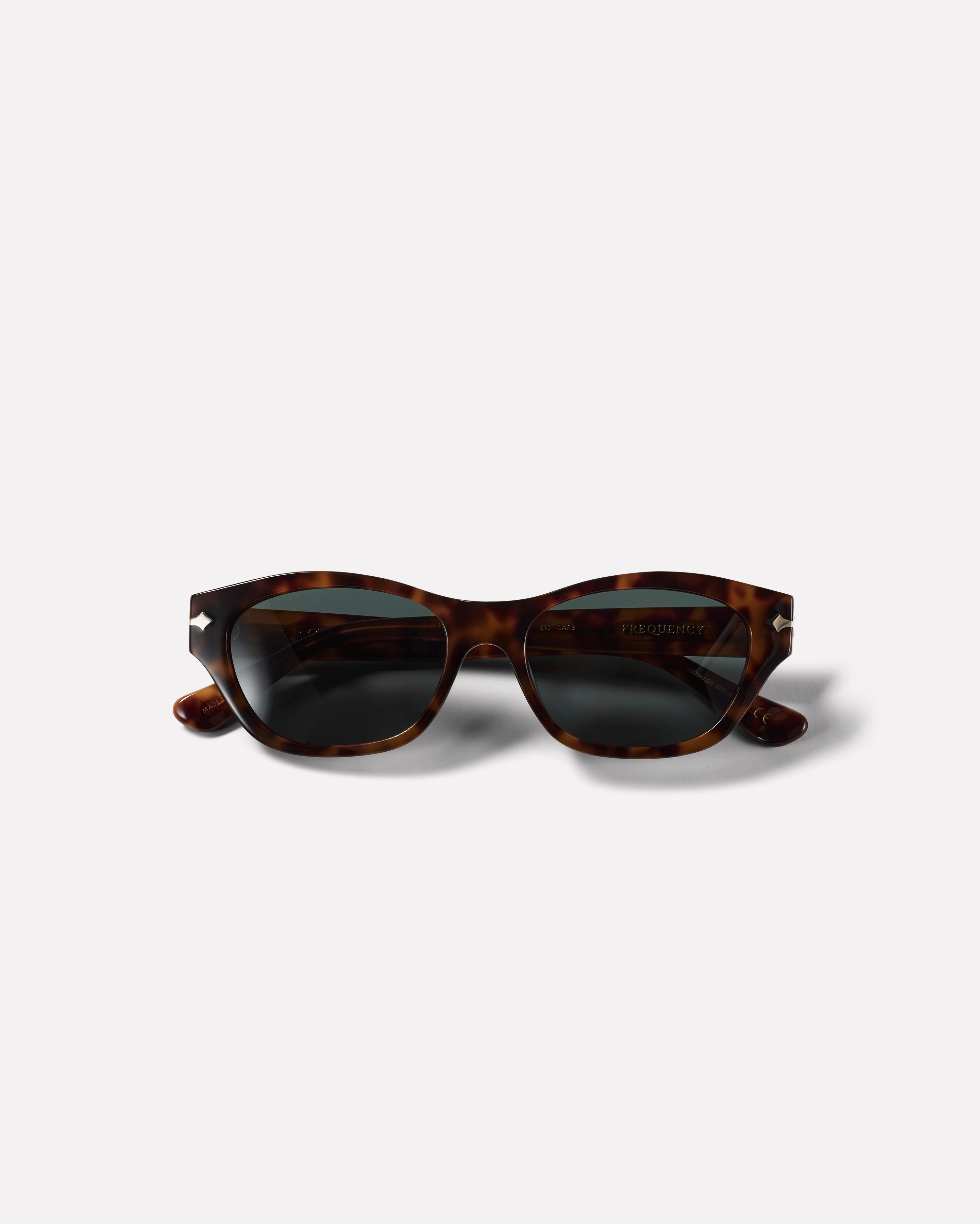 Frequency - Amber Tortoise Polished / Green